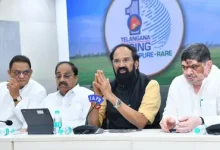 Massive stock of rice sacks representing successful paddy procurement in India at a government center.