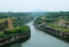 Water flowing through the Telugu Ganga canal gates at Zero Point in Uthukottai toward Chennai reservoirs.