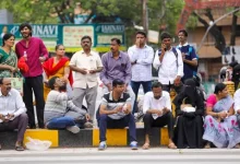 Medical aspirants and parents gathered outside a NEET UG 2026 re-exam centre in Hyderabad, Telangana, undergoing security checks.