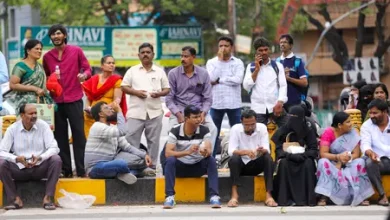 Medical aspirants and parents gathered outside a NEET UG 2026 re-exam centre in Hyderabad, Telangana, undergoing security checks.