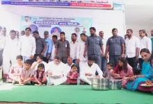 Students receive meals under the Telangana breakfast scheme in a government school