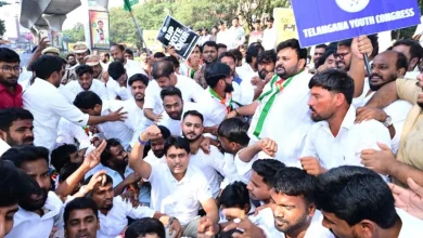 Hyderabad police detaining Youth Congress workers before the BRS NEET protest at Indira Park.