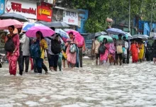 Mumbai rains Orange Alert as heavy rainfall causes flooding and schools remain closed.
